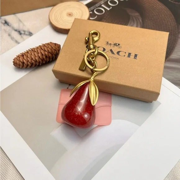 Coach Sparkling Red and Gold Pear Key Holder - Picture 5 of 6